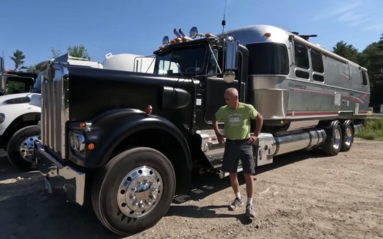 Retired trucker Charlie with his Kenworth truck that's fitted with an Airstream camper trailer
